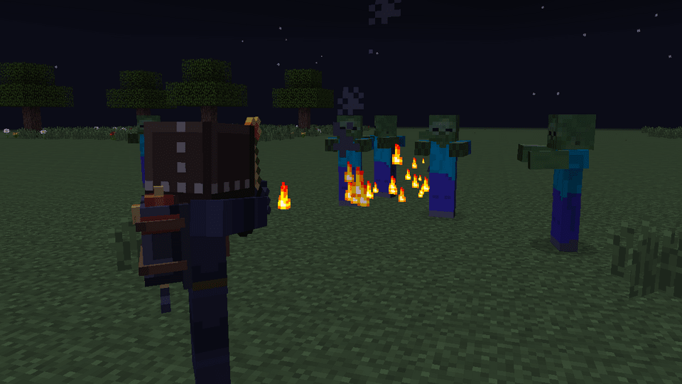A player with the Flamethrower Pack firing at zombies at night