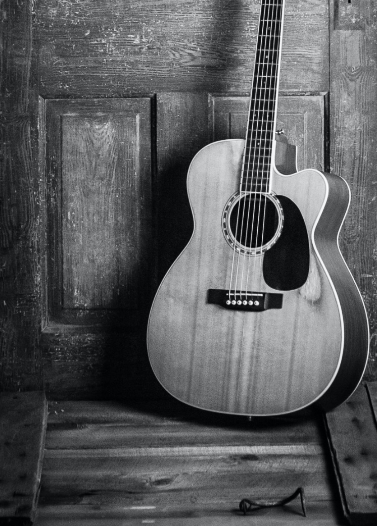 Music: guitar leaning against wall.