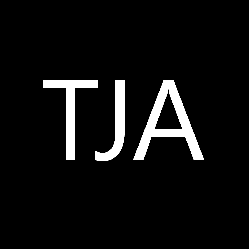 logo-tja-lg-white-on-black.png