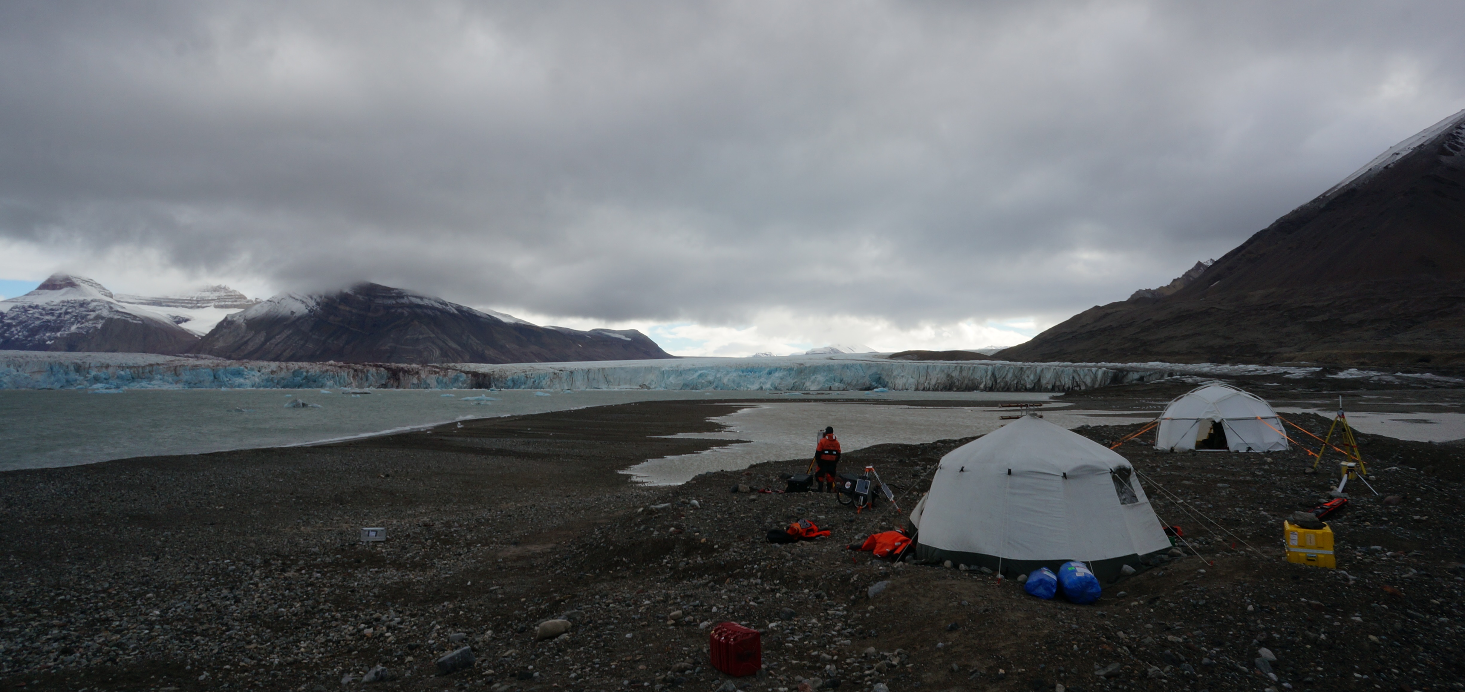 The CalvingSEIS group camp set-up besides Kronebreen glacier. The two tents contain valuable equipment - mainly the radar systems and the lidar system which were being used to scan the calving front of the glacier (August 2016)