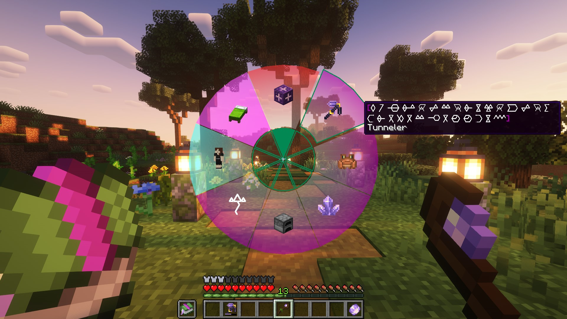 A screenshot of the spellbook radial menu with 8 sections. Each section has an icon. Clockwise from the top these are: Akashic Record Block, Hex Pickaxe, Frogi, Amethyst Cluster, Furnace, Summon Lightning Pattern, A minecraft player, A lime bed. The 2nd section is selected and has a tooltip containing hex patterns for a tunnel making hex labeled Tunneler. The caster is holding a dark oak staff with a dyed green leather-y bit and a dyed green covered spellbook.