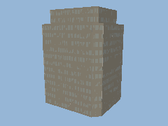 A seeded tower with a set-back crown turns under a lamp