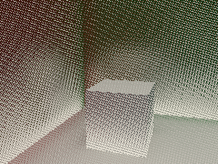 Red and green walls bounce light onto a white floor