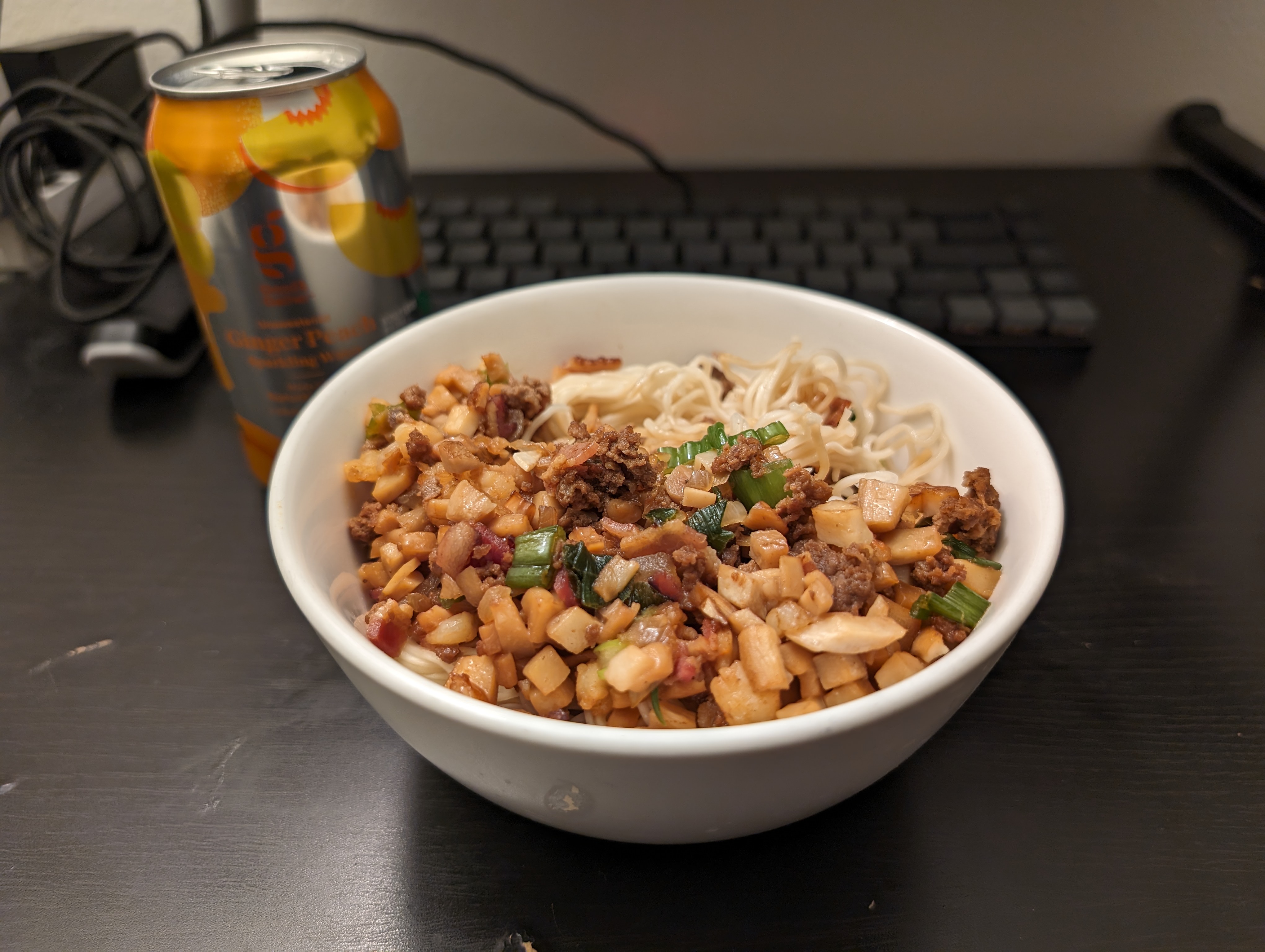 Minced meat noodles and sparkling water