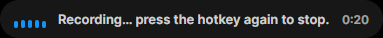 The dictation overlay during an active recording: level-bar indicator, "Recording… press the hotkey again to stop" text, and the elapsed timer