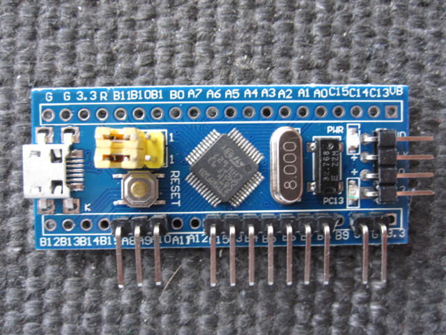 Header pins soldered to the STM32 board