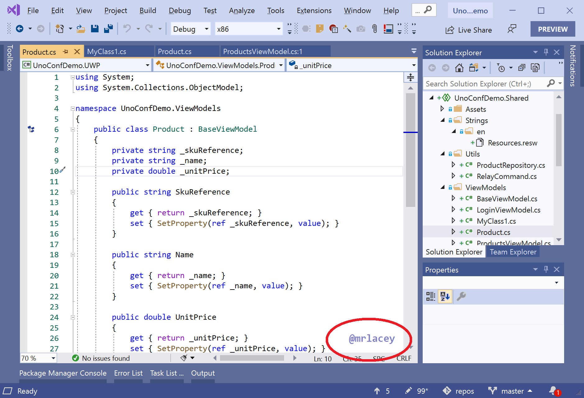 Visual Studio Editor window showing (highlighted) as watermark of my Twitter handle