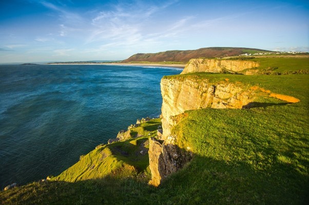 Cliffs overlooking the sea on a sunny day