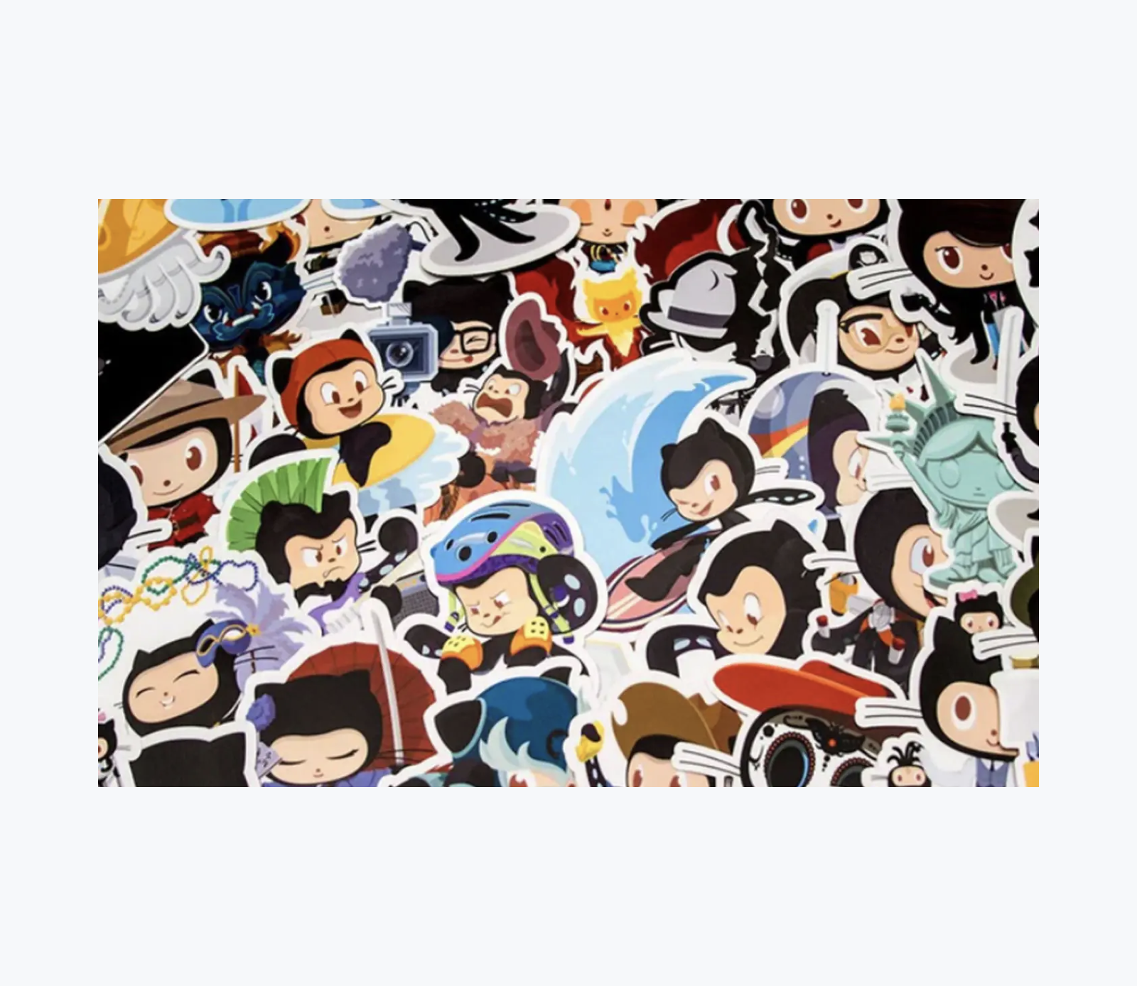 A chaotic pile of GitHub stickers