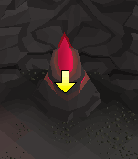An active glowing rock with a hint arrow