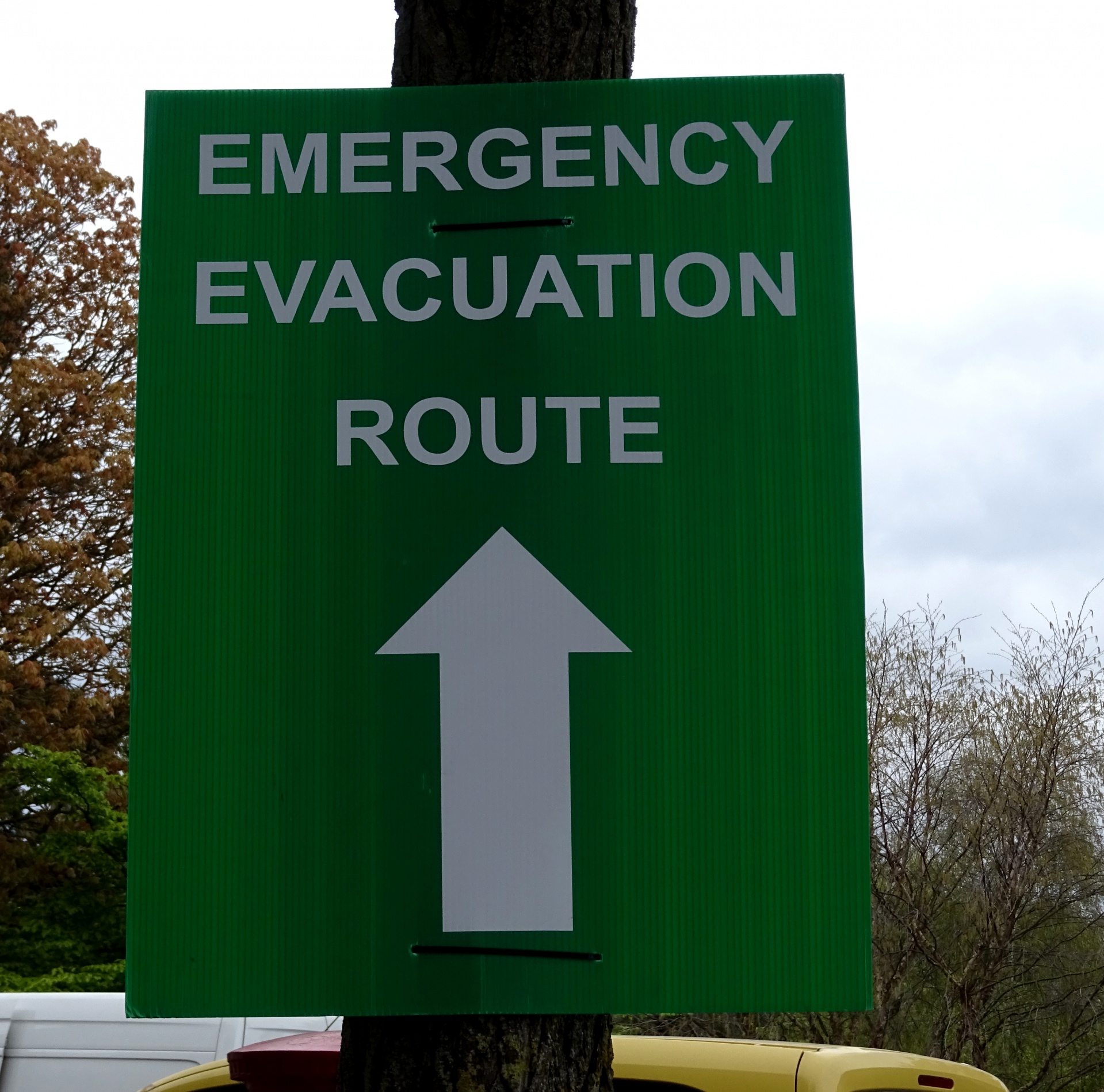 emergency-evacuation-route-signpost.jpg